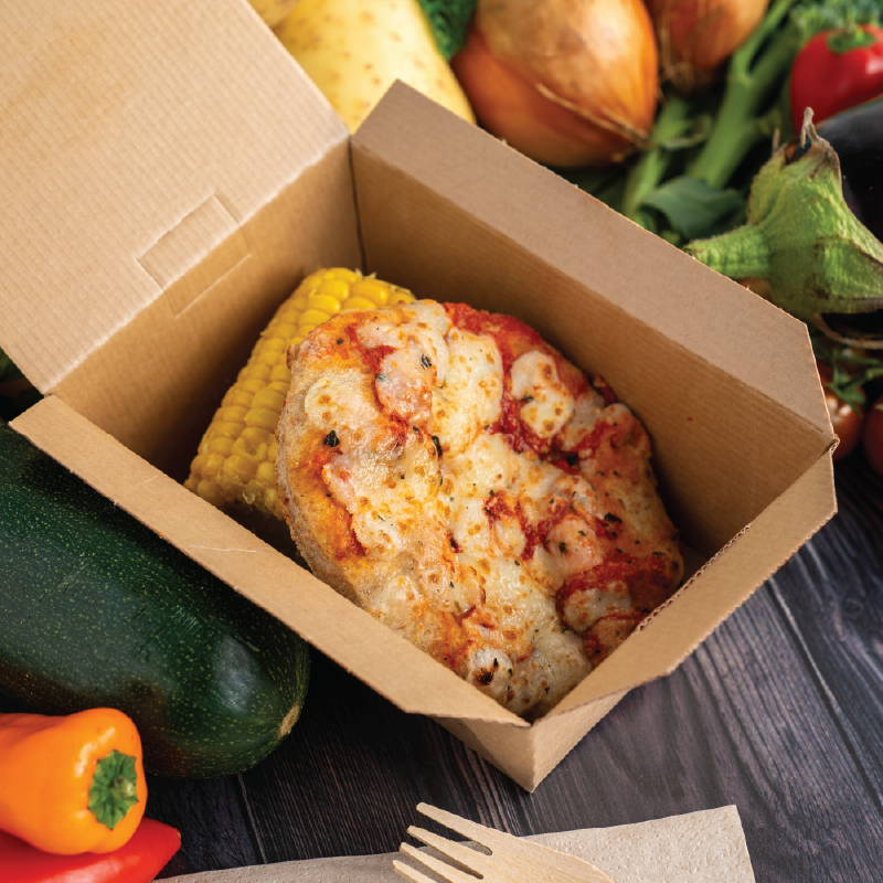 Freshtoday South West vegetarian pizza school meal served in an eco-friendly box with wooden cutlery